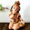 Terracotta Lord Krishna as butter thief eating butter from his pot - Image 2