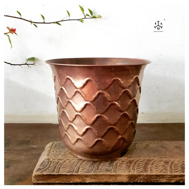 Classic planter wave pattern years old golden brass