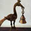 Ornate brass peacock holding the bell decor accent - Image 2