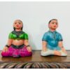 Terracotta brother and sister practicing meditation,