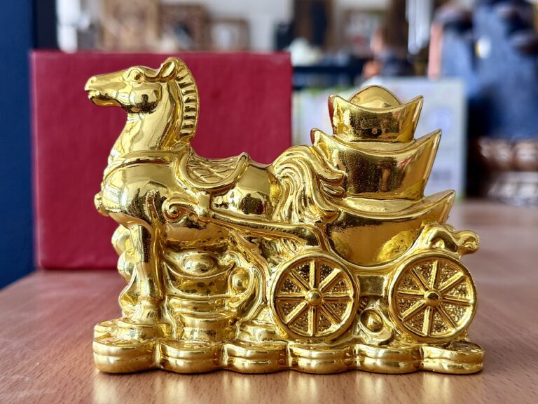 Feng Shui prosperity golden galloping horse with cart filled with golden bowl, gold coins all around