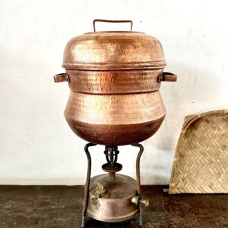 Kerala classic Copper Idly pot with idly steamer plate on top and perforated steamer dish At bottom