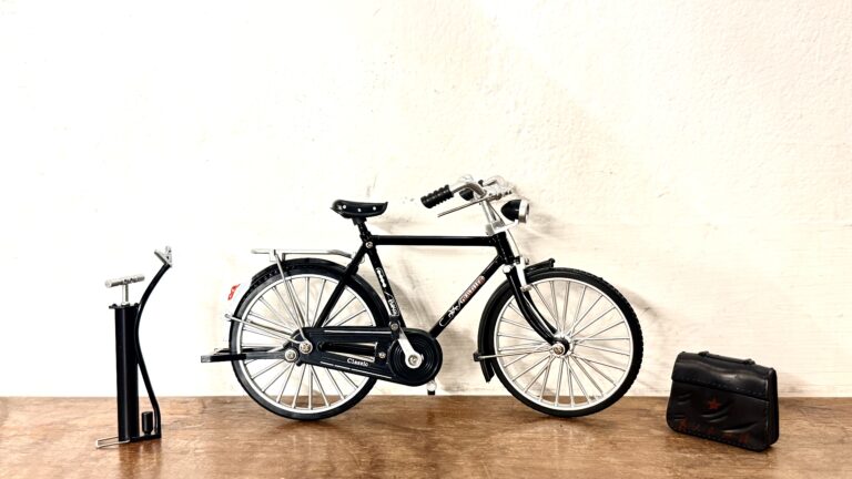 Classic Bicycle Cast iron frame with plastic and rubber parts Miniature